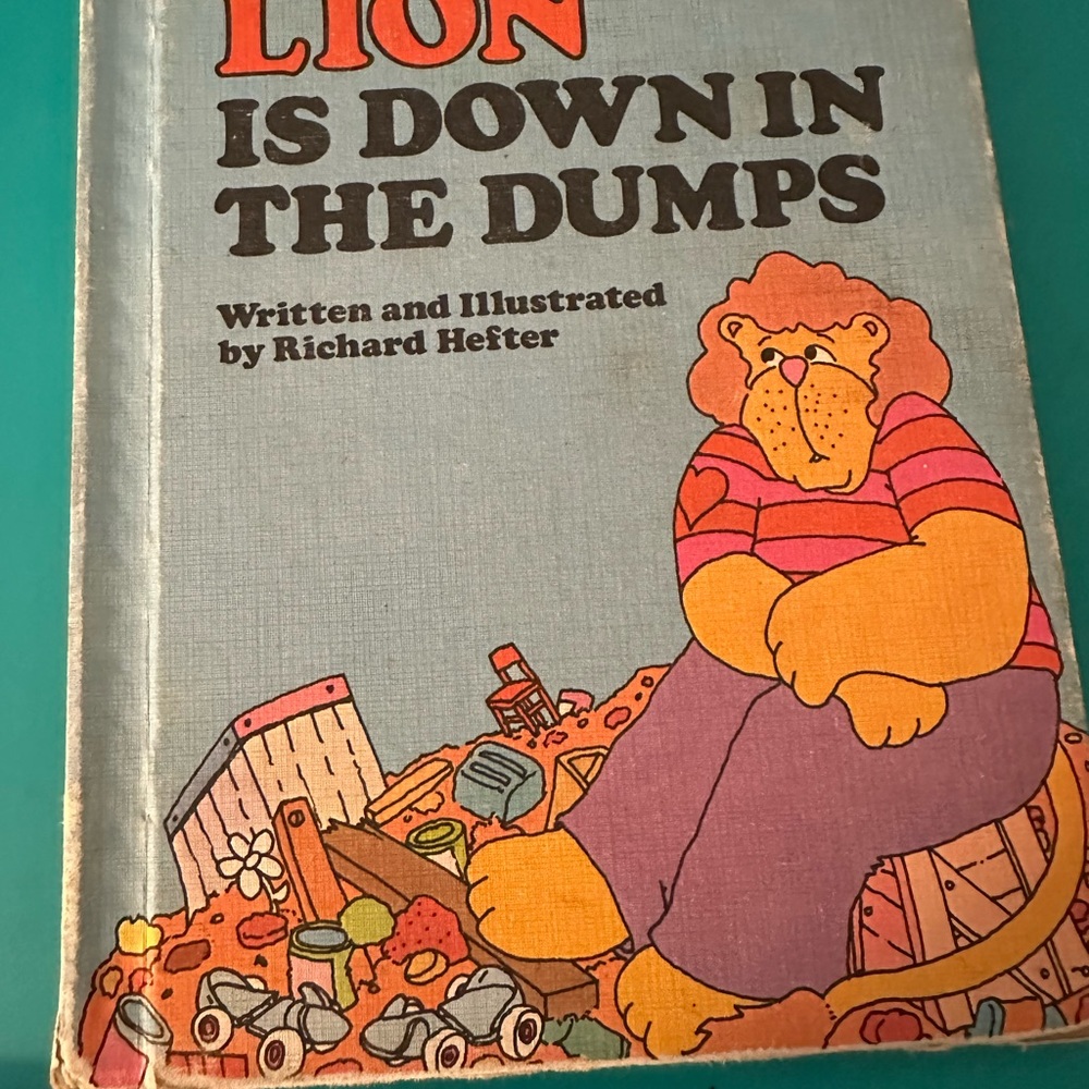 Lion is Down in the Dumps Book